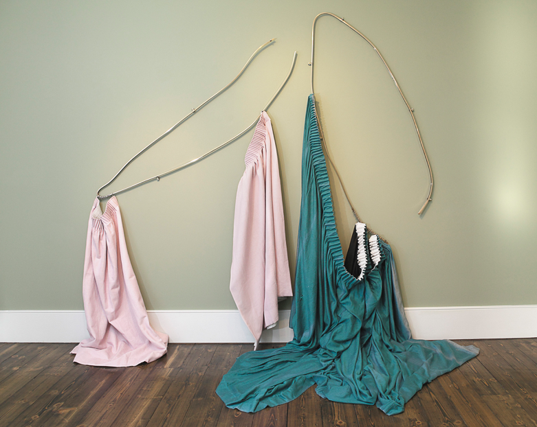 an abstract artwork of pink curtains and turquoise curtains, hanging down from askew curtain rods