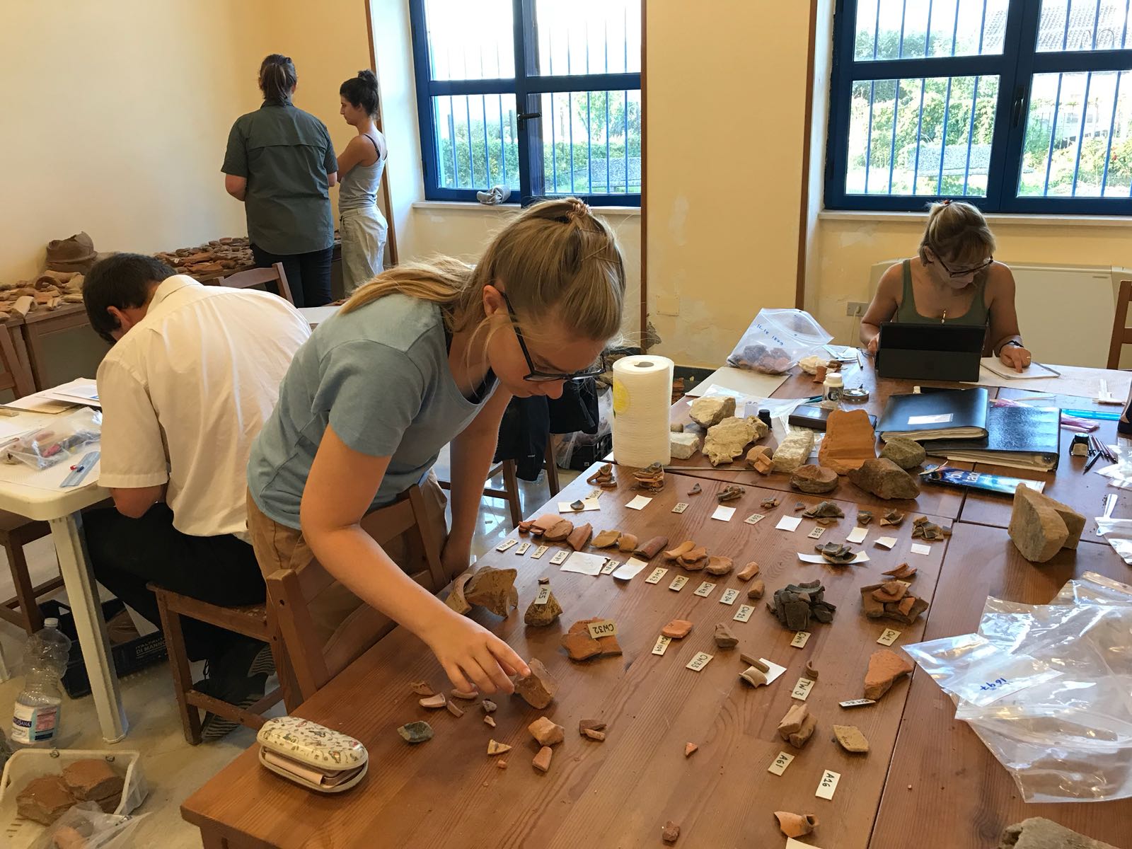 Cambridge Classics students sorting potsherds at the site of the Roman town of Interamna Lirenas 