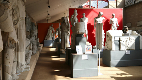 View of the interior of the Museum of Classical Archaeology with sunlight falling on the casts