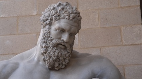 head of the Farnese Herakles, a bearded man looking down