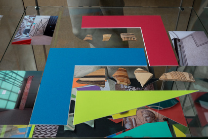 Blue, red and green mountboard shapes with postcard images
