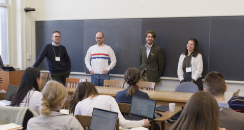 Event Organisers in front of blackboard in Yale