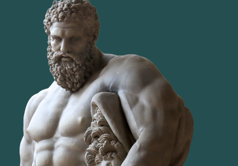 statue of very muscled Herakles, looking down