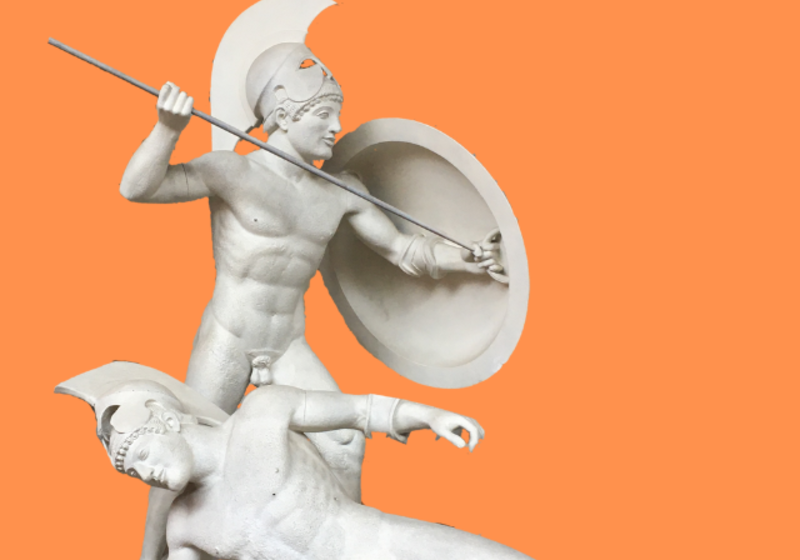 statues of two men fighting on orange background