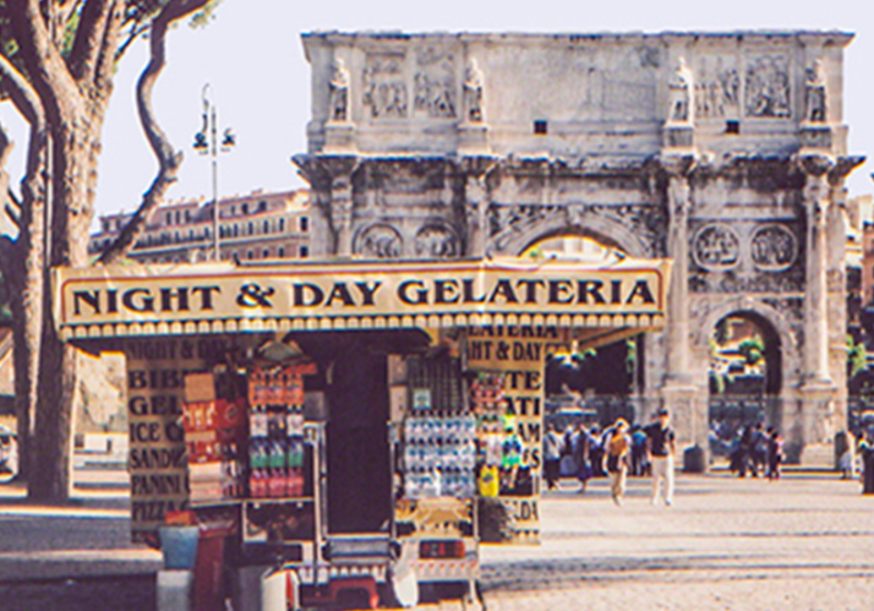 kiosk in front of arch in rome