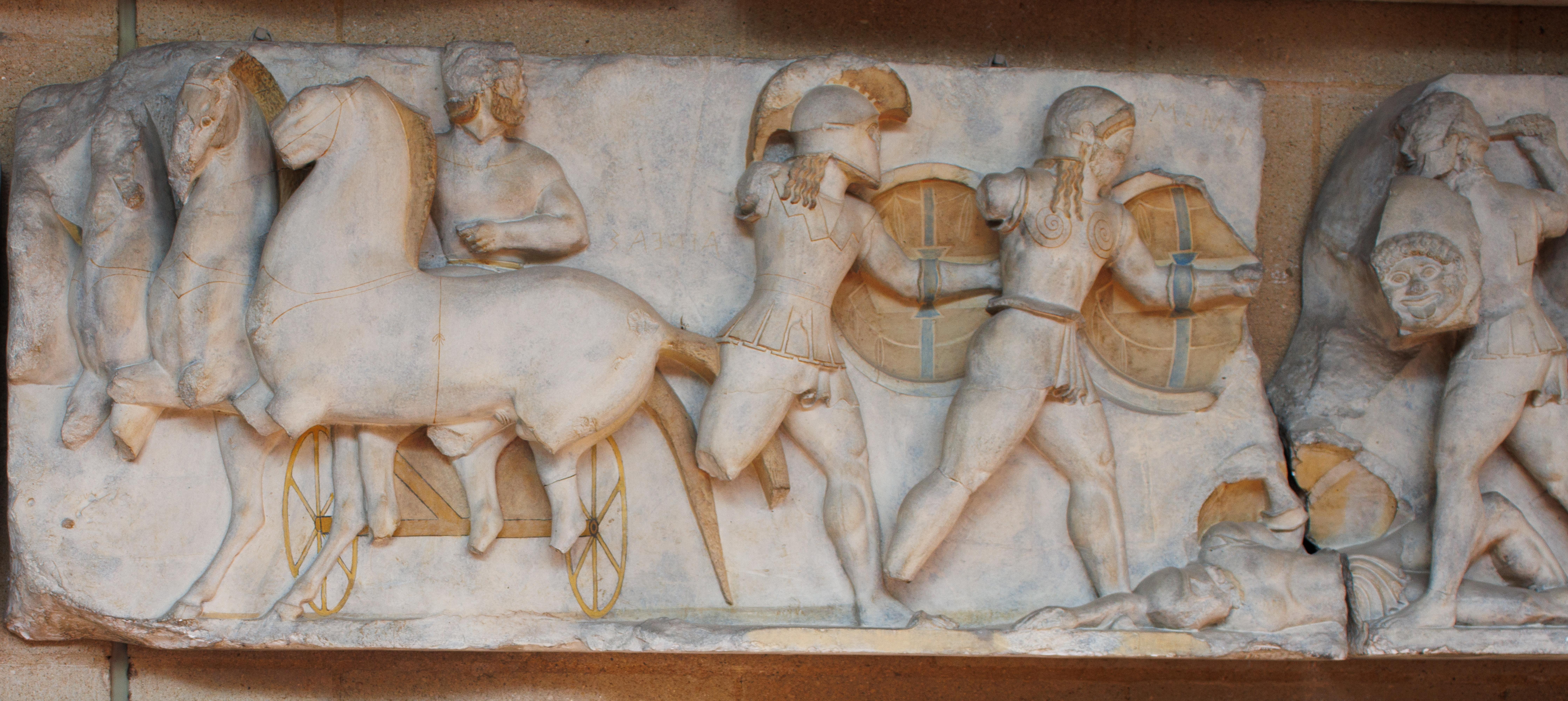 Frieze of men fighting
