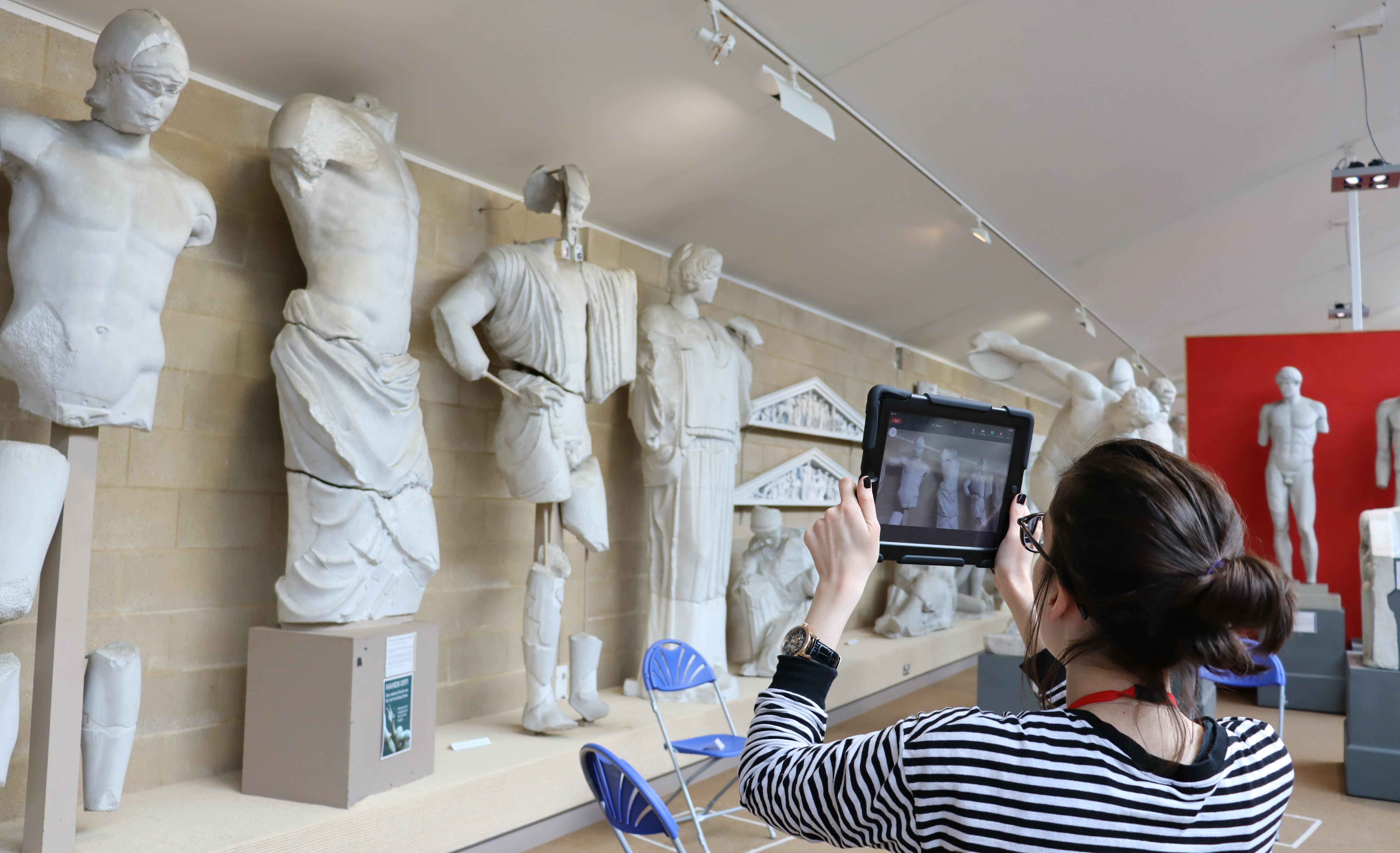 Justyna teaching from the gallery Facilitating school visits and learning Latin with MoCA