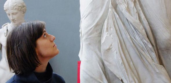 Rosy looks up at the Nike of Samothrace