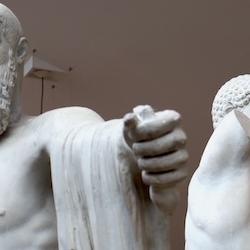 statues of a bearded and unbearded pair advance on the viewer with swords