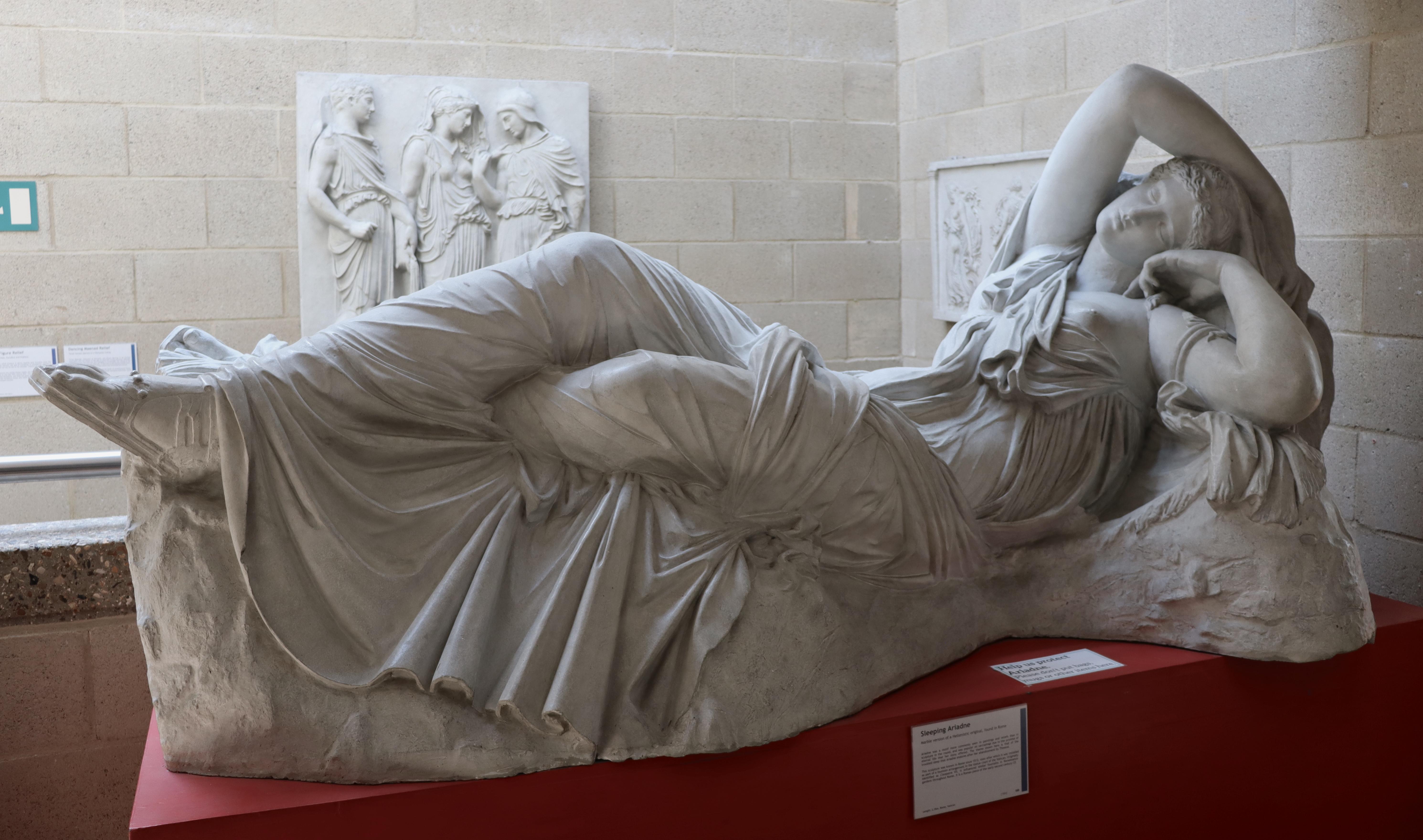 Statue of sleeping demale figure
